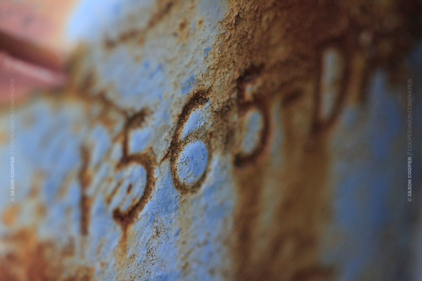 photo of numbers stamped in metal from an old tractor