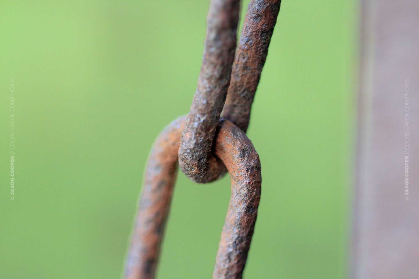 close up photo of an old rusty chain